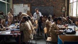 Salesians offering group lesson during leather-cutting course at Don Bosco Children Center, in Addis Ababa, Ethiopia