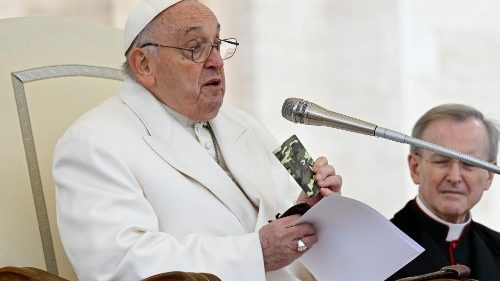 Pope Francis holding rosary and Gospel of young fallen Ukrainian soldier, Oleksandr, during his Wednesday General Audience