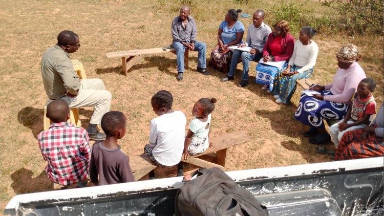 Zambia: Fr Cletus Mwiila, with a community of Masuku in Zambia